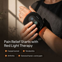 Wrist Bro wrap on hand with red light glow
